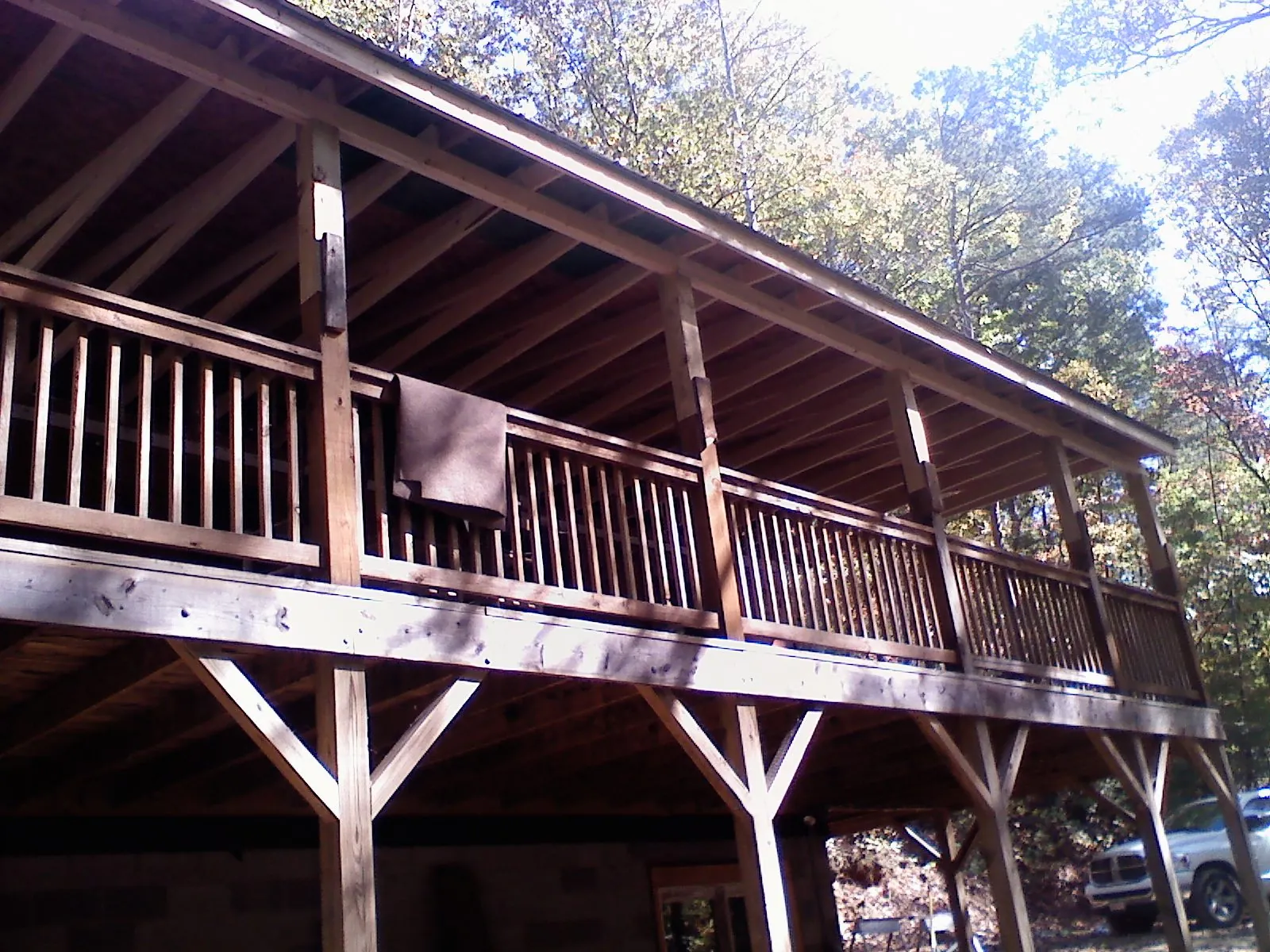Timber framing under a new elevated porch and deck — Roof Leak Repair in Hancock by Roofing Brothers